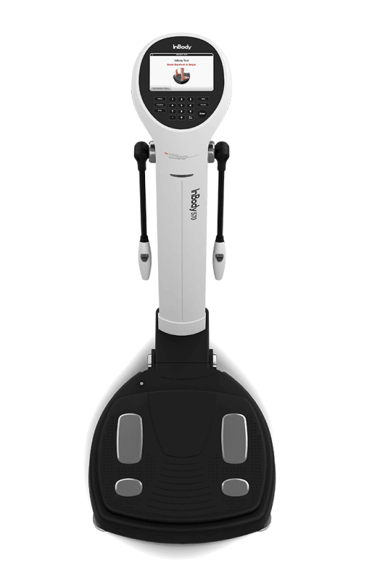 Full view of the InBody 570 body composition analyzer with hand grips and foot sensors, designed for precise body fat, muscle mass, and hydration level measurements.