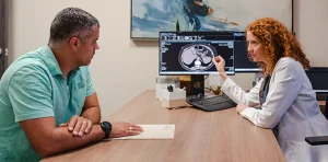 Doctor reviewing scan results with patient